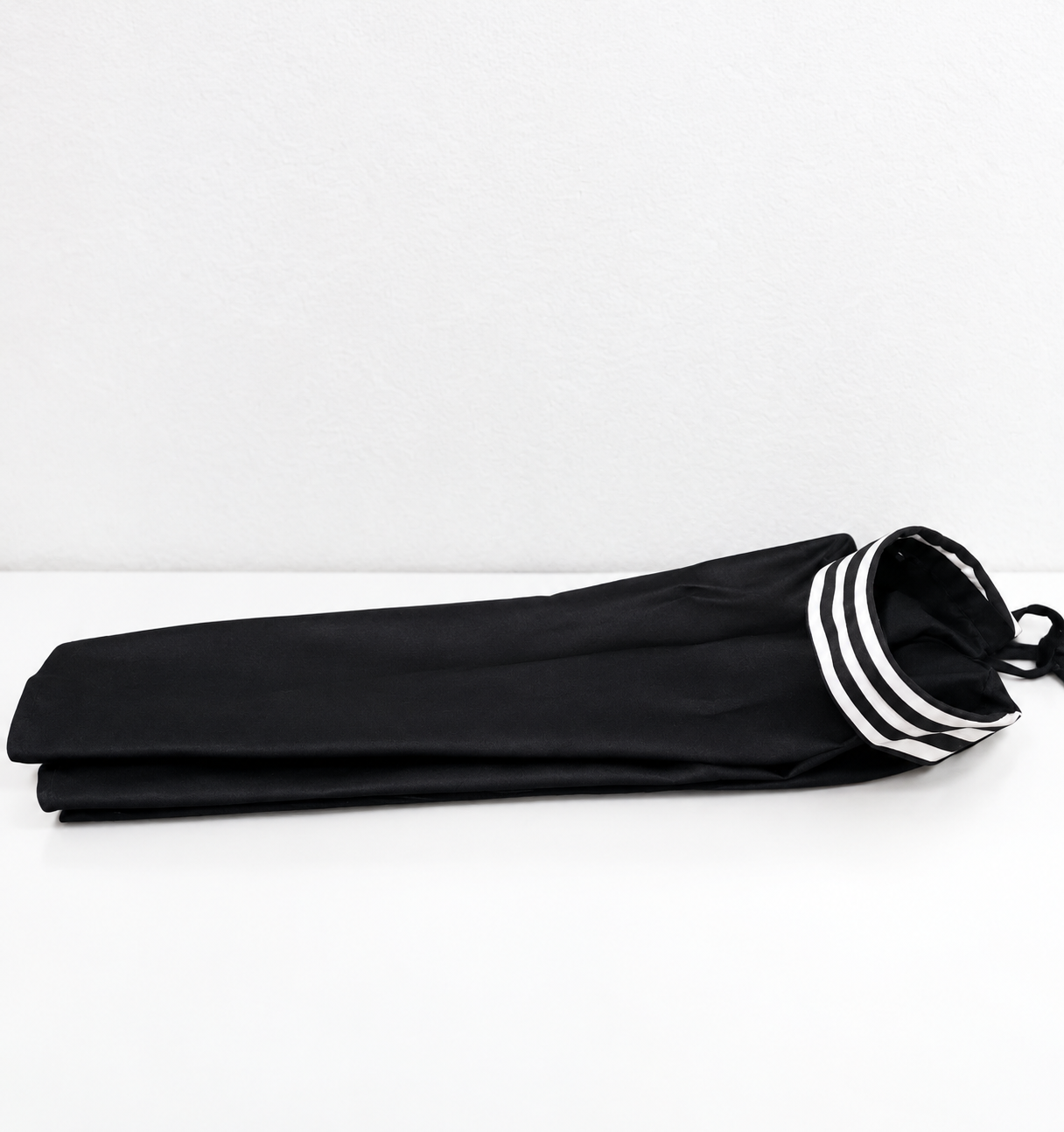 ACMC black veil with distinctive black-and-white striped trim