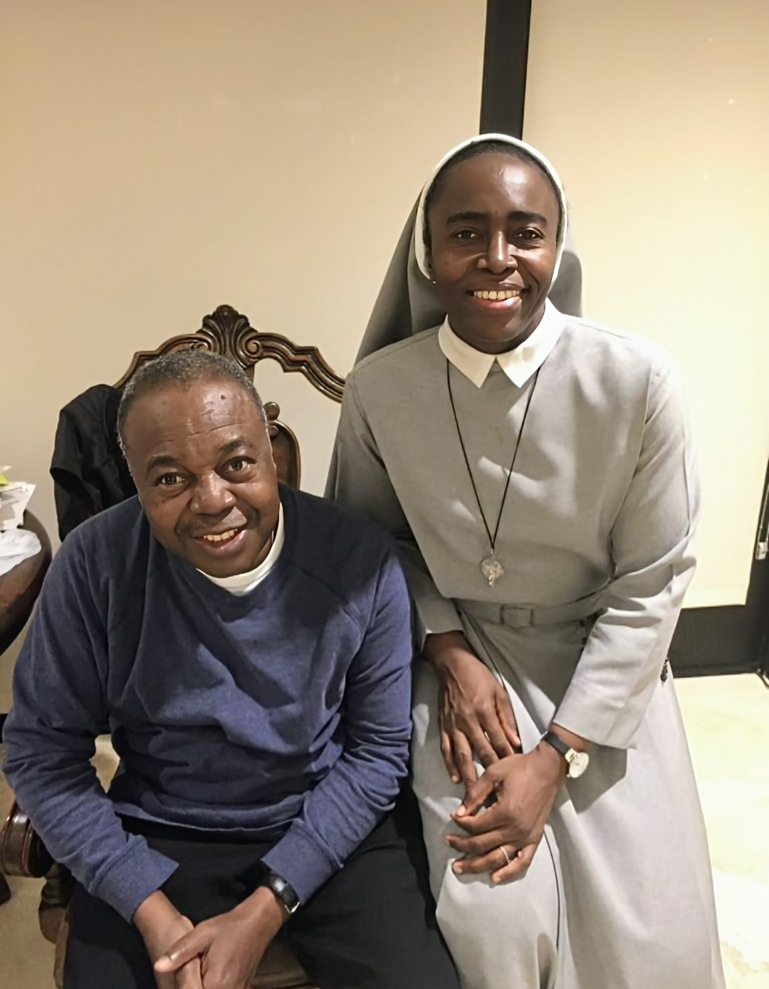 Sister Felicia with the late Bishop Peter I. Adoboh